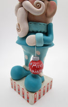 Christmas Santa Claus teal blue whimsical with ornament