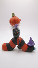 Halloween folk art Pumpkin man riding Halloween color caterpillar