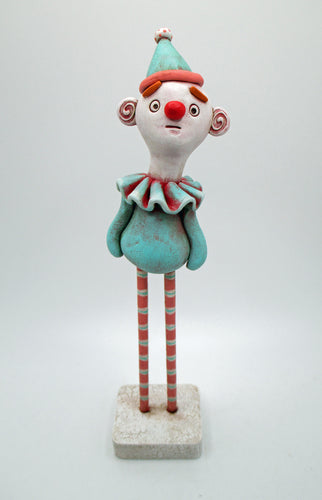 Spring time clown with wood legs and hat misc