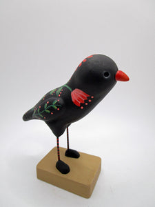 Paper clay folk art style black bird with coral flowers and leaf design misc