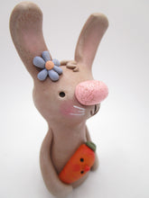 Easter bunny with silly carrot friend
