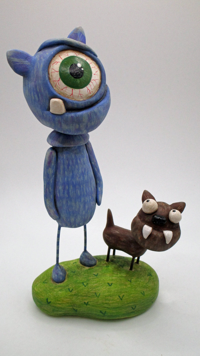 One eye monster and his pet dog PAPER CLAY with colored pencil finish –  pumpkinseeds folk art by janell berryman