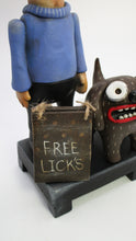 Art character Folk Art man and dog "free licks"