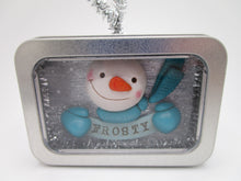 Christmas ornament with Snowman inside of tin box