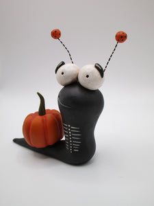 Halloween garden pumpkin snail