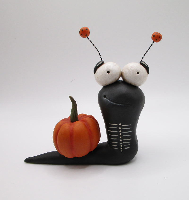 Halloween garden pumpkin snail