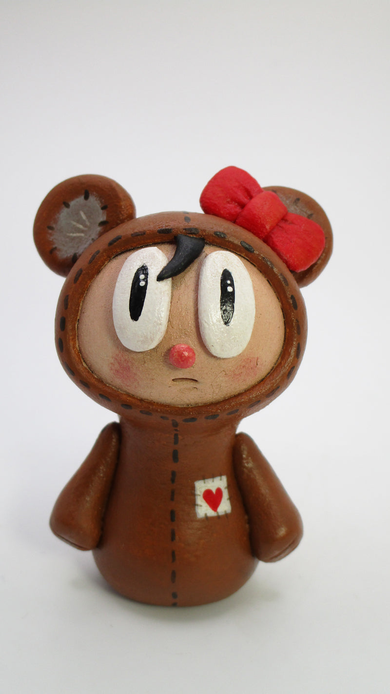 Little bear girl art character with big eyes and heart patch