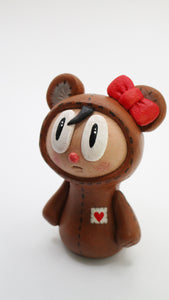 Little bear girl art character with big eyes and heart patch