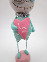 Valentines folk art girl skelly skeleton with big pink I love you heart