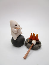 Halloween folk art ghost with campfire and marshmallows