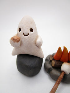 Halloween folk art ghost with campfire and marshmallows