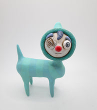 Art character four legged creature with red nose and eye swirl- monster ?