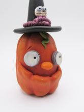Halloween folk art orange pumpkin with cool witch hat