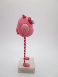 Valentine pink owl with long striped legs