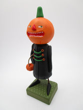 Halloween folk art old fashion Pumpkin man with black jacket