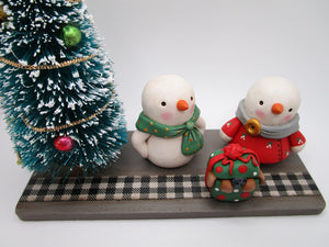Christmas scene PUP surprise with snow family and bottle brush tree