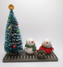 Christmas scene PUP surprise with snow family and bottle brush tree