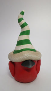 Christmas folk art style red cardinal bird with tall striped hat
