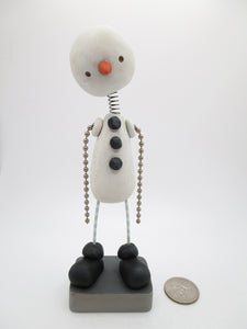 Christmas folk art snowman bobble head with ball and chain arms