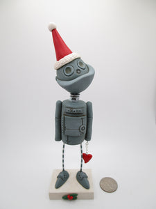 Christmas ROBOT wearing Santa hat with love