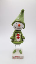 Christmas folk art style snowman with Santa snowy "sweater"