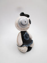 Halloween stitch style sitting skelly girl with bow