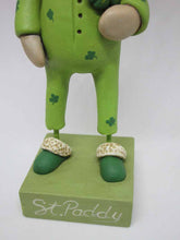 St. Patrick's day Sleepy time leprechaun wearing long john jammies