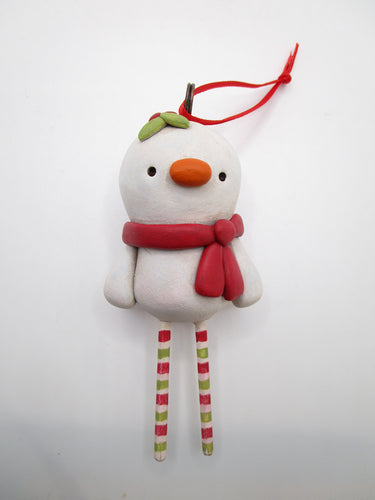 Snowman ornament with wooden legs ready for your tree