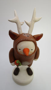 Christmas Snowman wearing reindeer costume with antlers!