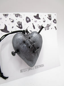 Halloween dark heart ornament with metal stitches and nails