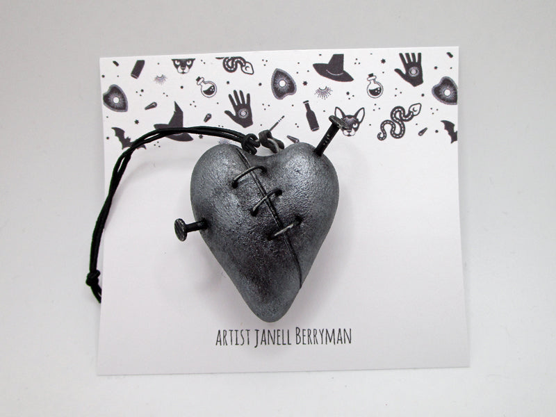 Halloween dark heart ornament with metal stitches and nails