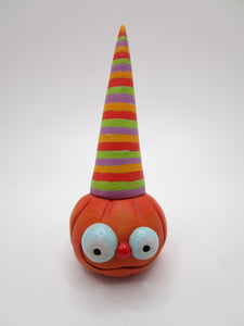 Halloween folk art small pumpkin with tall striped cap