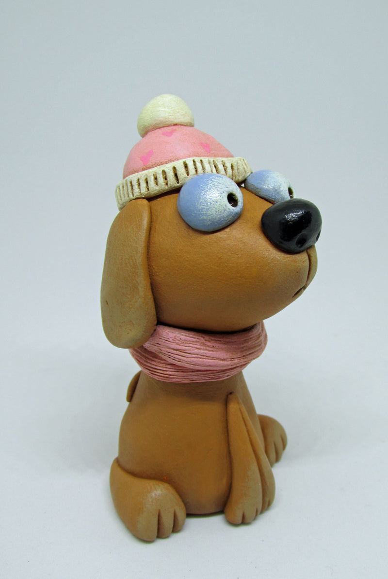 Valentine brown dog with pink heart beanie and matching scarf