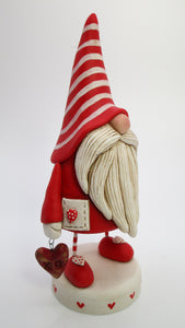 Valentine Gnome with lots of hearts and a heart charm