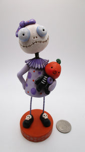 Halloween BOBBLE head skelly girl with pumpkin doll in arms