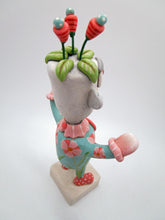 Wacky wild man with floral suit and silly flowers on his head - wacky character