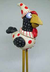 Christmas chicken with wood legs wearing pajamas